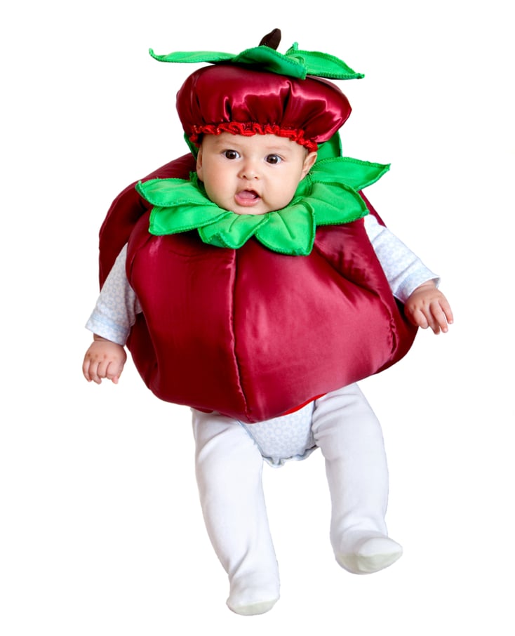 Baby boy portrait with a mulberry costume over a white background