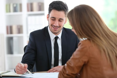 Woman meeting financial adviser in office-1