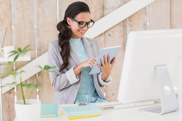 girl looking at tablet