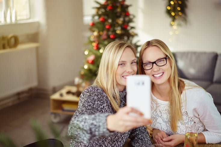 millennials taking a selfie